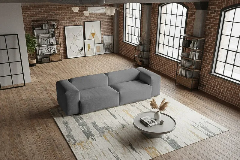 KAWOLA Sofa CELESTE 4-Sitzer mit Hocker Cord grau