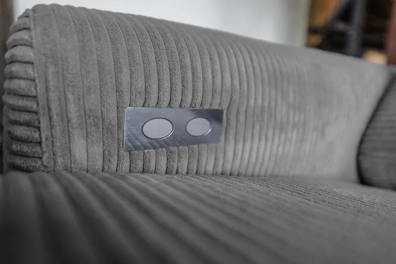 KAWOLA Sofa LAISKA Ecksofa Relaxfunktion teilmotorisch Cord grau