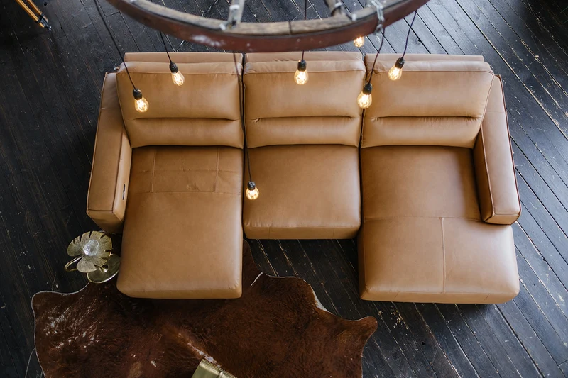KAWOLA Big Sofa DORI motorischer Sitzvorzug Leder cognac