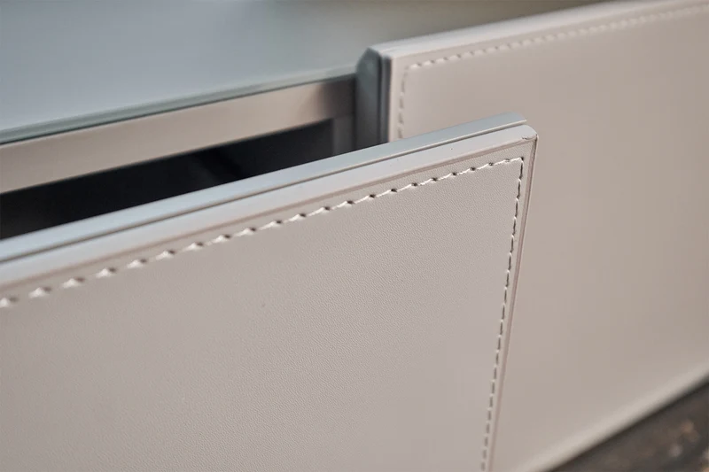 KAWOLA Lowboard EMMA TV-Board Kunstleder grau Fuß Edelstahl messingfarben