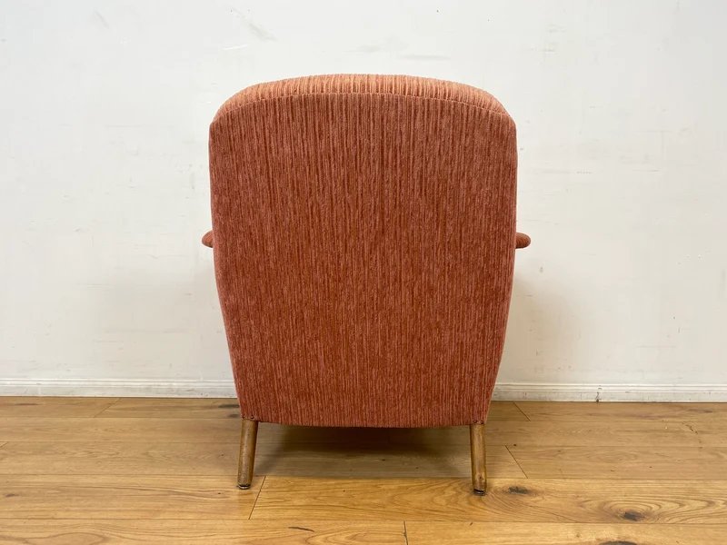 WMK I Formschöner & sehr gut erhaltener skandinavischer Mid-Century Sessel in Altrosa mit bequemen Federkernsitz
