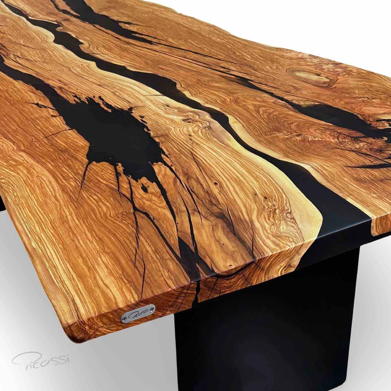 Design Epoxy Esstisch Unikat aus Olivenholz auf Stahlwangen