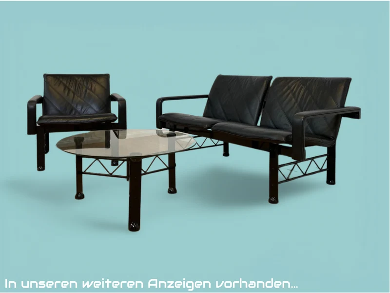 WMK # Stilvoller & hochwertiger Designersessel von Klöber aus 1996 mit Kunstleder Bezug auf schwarzem Metallrahmen